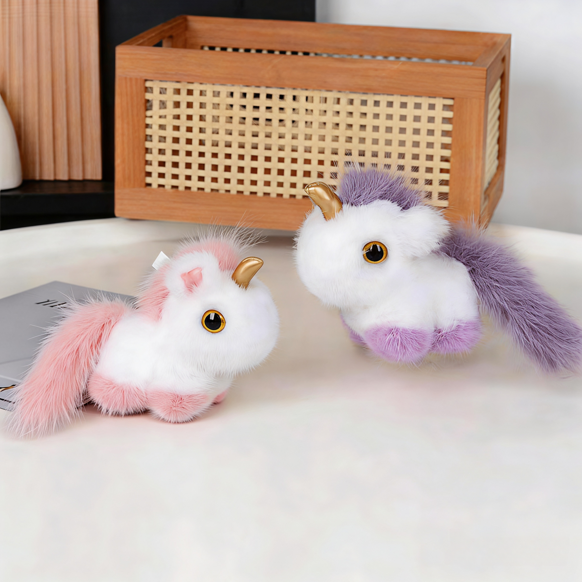 Plush unicorn keychain clipped to a backpack — a non-chocolate advent calendar filler idea