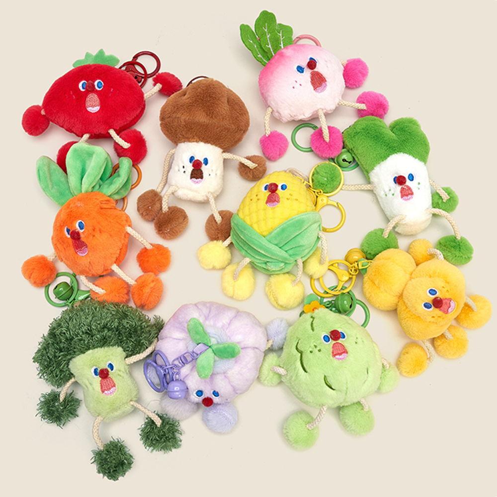 Poseable veggie plush keychain on a backpack