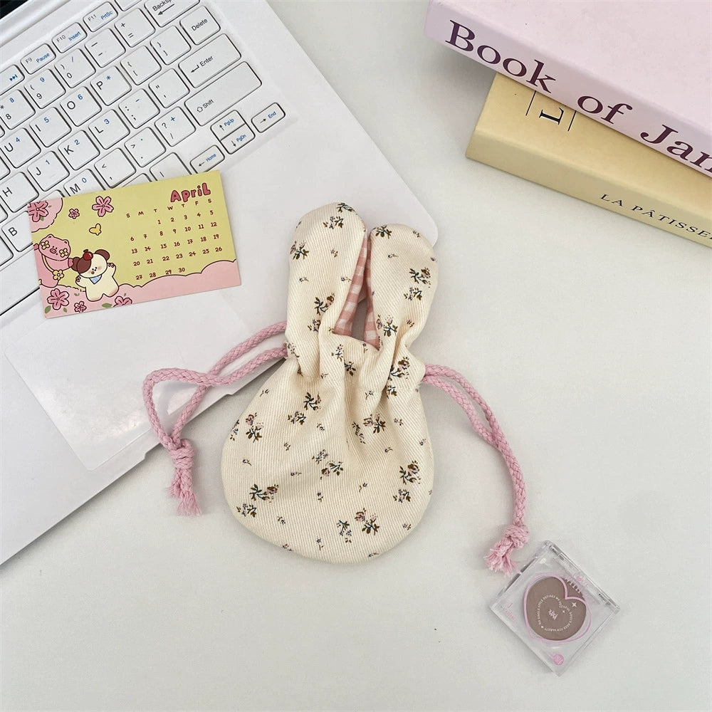 Cute pouch with rabbit ears in use